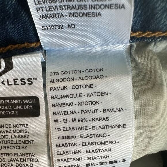 Levi's 70s Inspired High Rise Slim Fit Medium Wash Raw Edge Flare Denim Jeans 28 - Picture 13 of 13